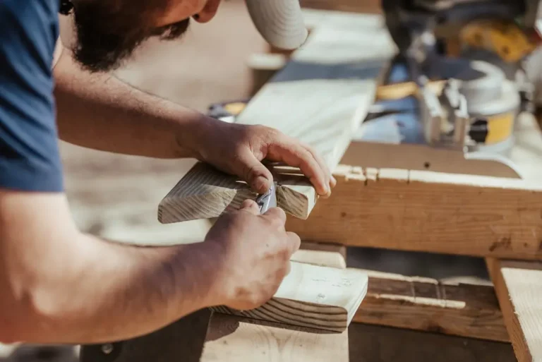 Contractor Cutting Wood